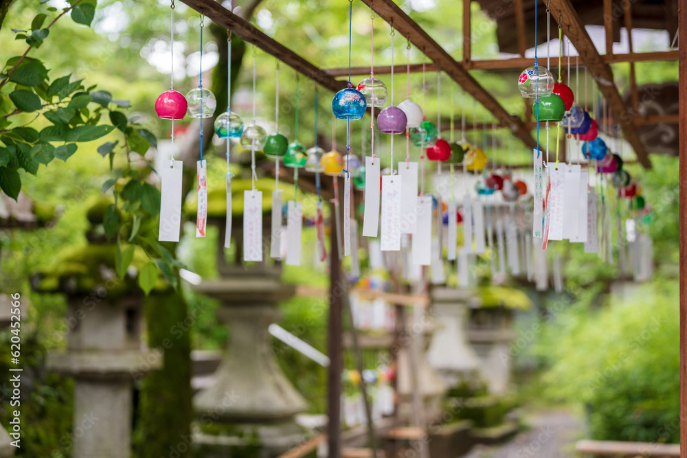 Kyoto, Japan - June 12 2023 : Japanese wind chimes at Matsunoo Taisha Shrine. Japanese Garden Wind bells.