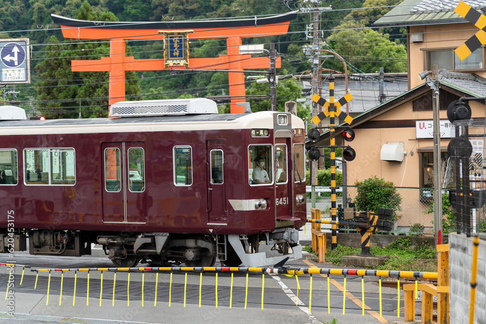 Kyoto, Japan - June 12 2023 : Hankyu Arashiyama Line train on Matsuo-taisha Station. Kyoto, Japan - June 12 2023 : Hankyu Arashiyama Line train on Matsuo-taisha Station.
