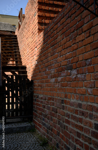 old brick wall. Remains of the old earth wall.