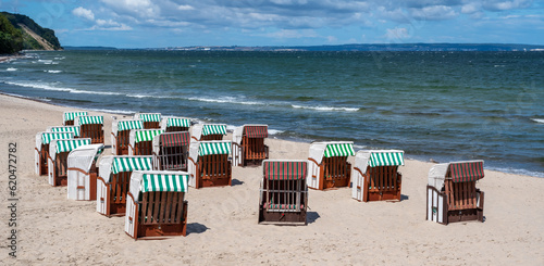 Beach chairs at the Baltic Sea . Pier of Sellin at Ruegen Island, Germany. photo