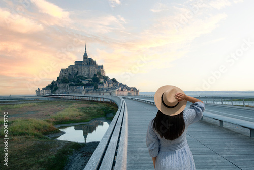 nature, people, holiday, monument, destination, person, touristic, town, woman, brittany, historic, looking, building, view, trip, historical, history, village, mont saint michel, journey, summer, out © BUSARA