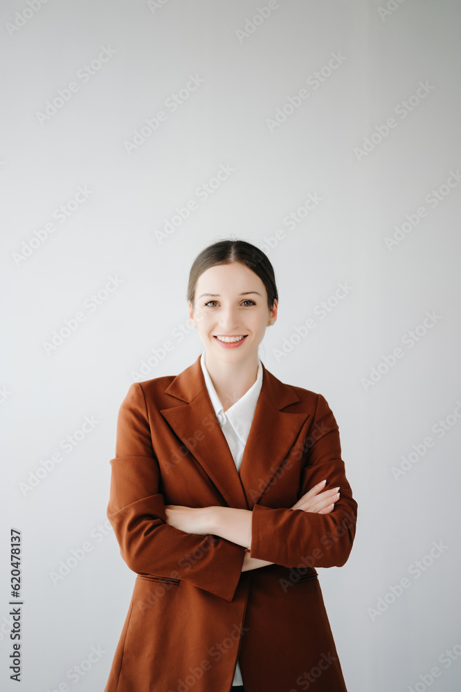 Smiling caucasian young businesswoman bank employee worker manager boss ceo looking at camera, using tablet, laptop and notepad online isolated in white background. Smiling caucasian young businesswoman bank employee worker manager boss ceo looking at camera, using tablet, laptop and notepad online isolated in white background.