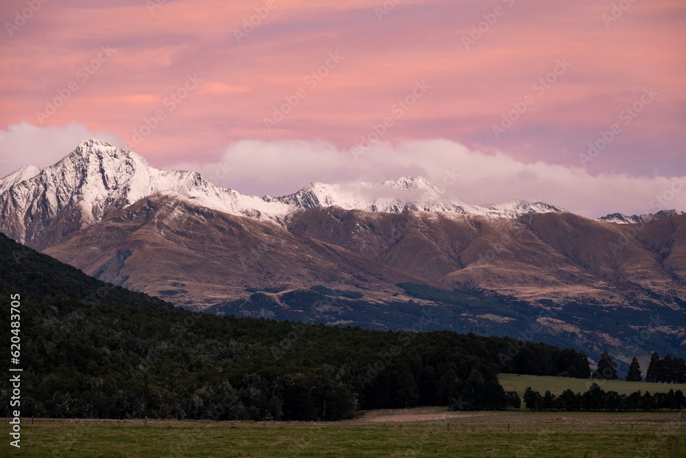 Snow Capped Mountain Range at Sunset