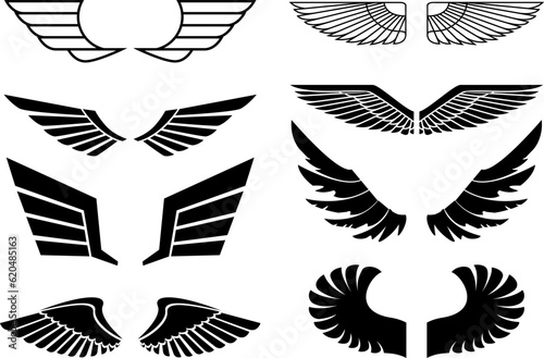 Wings set on white background. Heraldic wings. Element for logo,label and emblems design. Vector illustration.