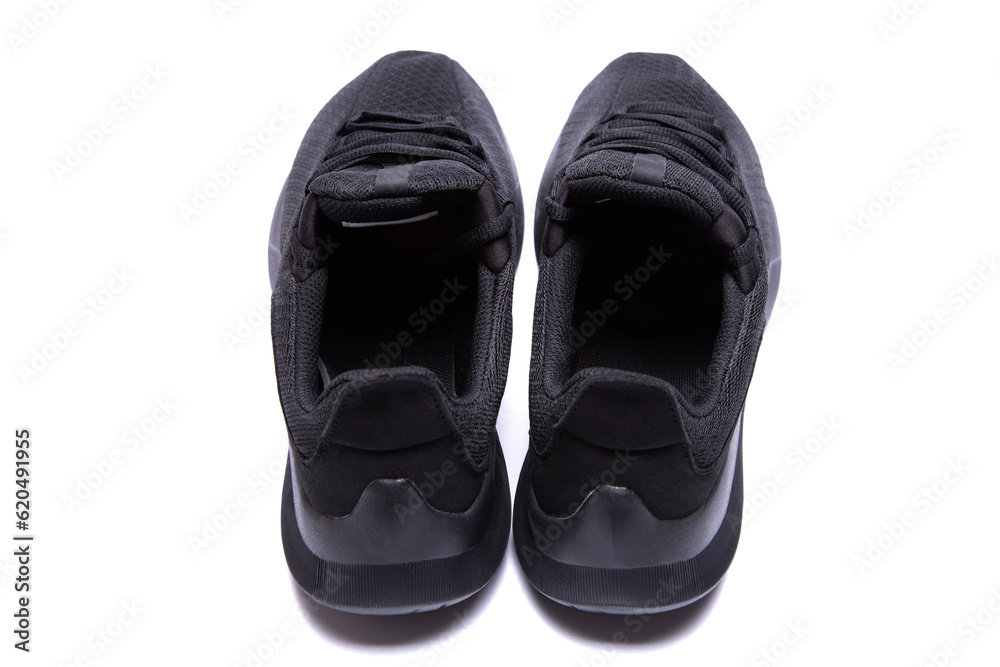 athletic lightweight black sneakers insulated on a white background isolate