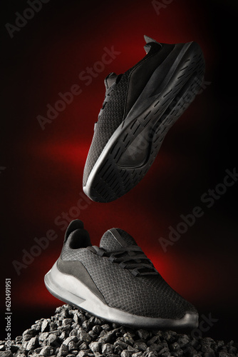 sports sneakers on a black background with a stylish design for the banner and store advertising