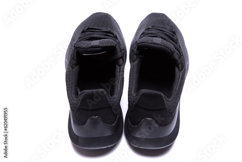 athletic lightweight black sneakers insulated on a white background isolate