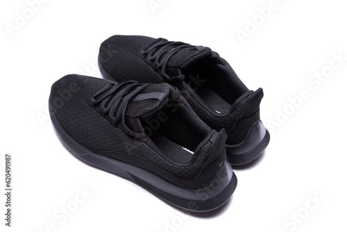 athletic lightweight black sneakers insulated on a white background isolate