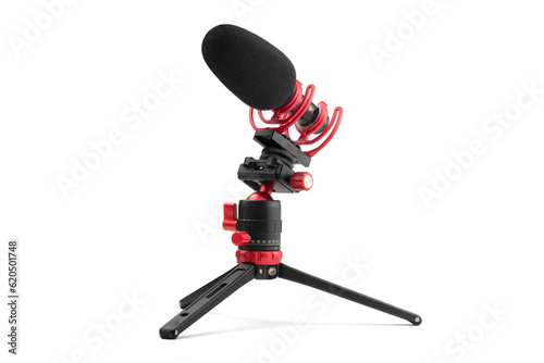 On Camera Hotshoe Mount Microphone with Windscreen and Shock Mount On Small Mini Aluminum Tabletop Tripod Isolated with Shadow