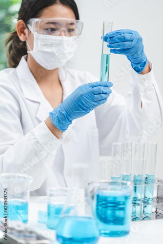 medicine research in chemical laboratory, chemist scientist working with liquid experiment test analysis by using scientific tube beaker glassware, chemistry science pharmaceutical medical lab concept