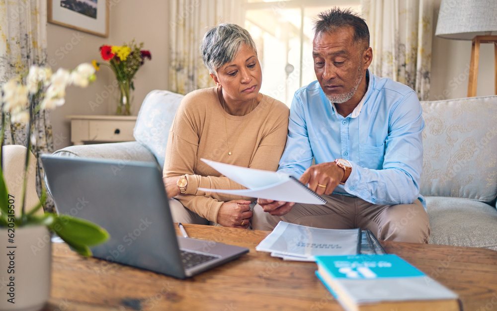 Laptop, documents and payment with a senior couple in the home living room for retirement or budget planning. Computer, financial or investment savings with a mature man and woman in a house Laptop, documents and payment with a senior couple in the home living room for retirement or budget planning. Computer, financial or investment savings with a mature man and woman in a house