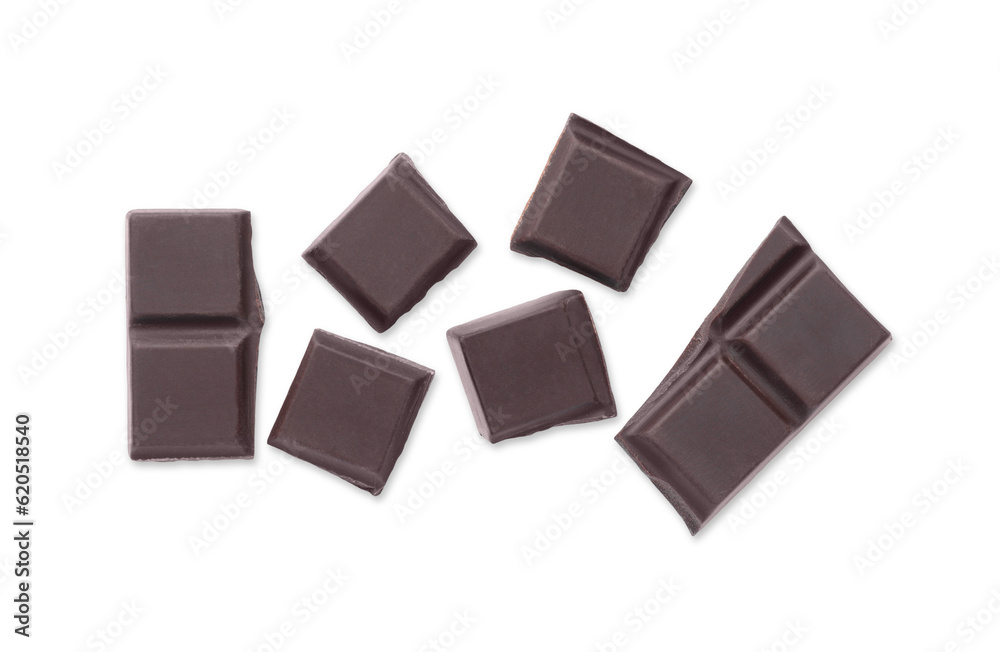 Pieces of delicious dark chocolate bar on white background, top view