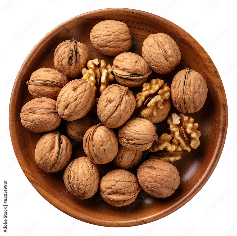 Walnuts lie in a brown bowl. Nuts in a plate top view. Isolated on transparent background. KI. Walnuts lie in a brown bowl. Nuts in a plate top view. Isolated on transparent background. KI.