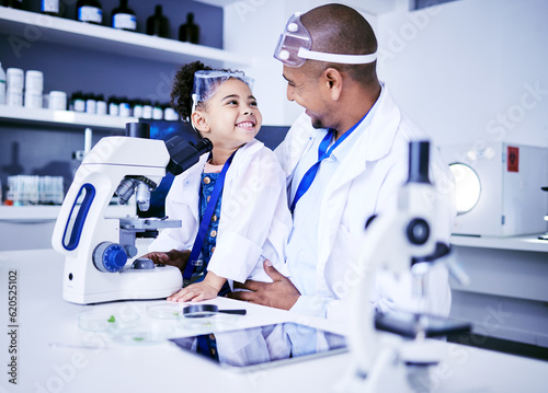 Science  microscope and father with child in laboratory for medical research  chemistry and education. Healthcare  family and scientist with girl with equipment for knowledge  learning and teaching