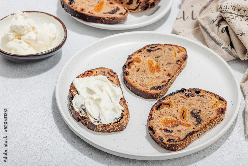 Sweet bread with raisins, dried apricots, dates, figs. Healthy ingredient for sandwiches, breakfast