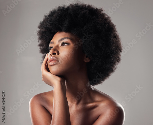 Skin, face and natural beauty, black woman thinking, cosmetics and glow isolated on studio background. Skincare, dermatology and facial treatment, African model with makeup and ideas with shine