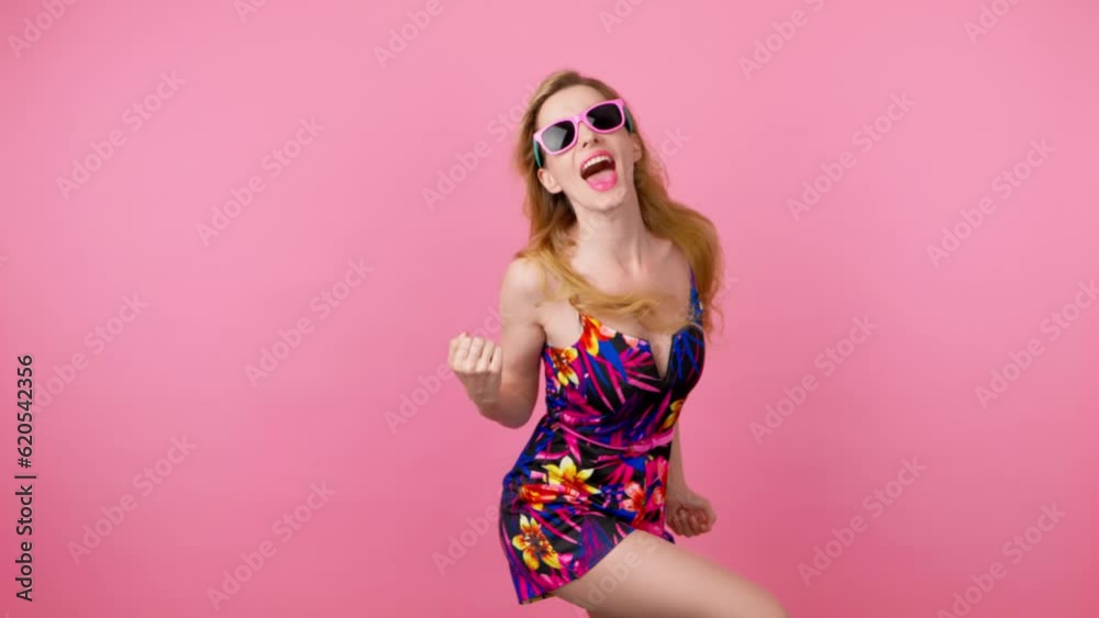 Yes gesture and winner fashionable hipster woman smiling nodding, index Yes. Excited happy lady showing approving gesture, thumbs up, triumph, success. Trendy makeup, floral outfit, pink background Yes gesture and winner fashionable hipster woman smiling nodding, index Yes. Excited happy lady showing approving gesture, thumbs up, triumph, success. Trendy makeup, floral outfit, pink background