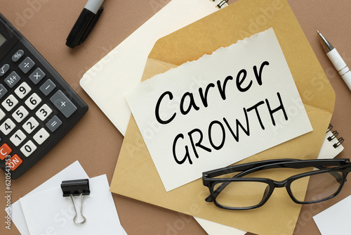 Wallpaper Mural CARRER growth. torn page from a notebook on an envelope with text. calculator and glasses Torontodigital.ca