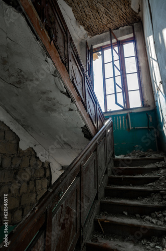 inside a destroyed house without people in an abandoned city in Ukraine © Sofiia
