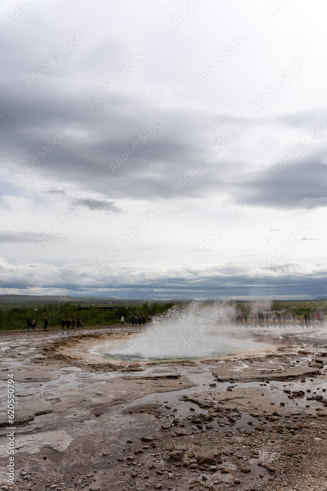 Iceland - 06.30.2023: Strokkur geyser erupting Iceland - 06.30.2023: Strokkur geyser erupting