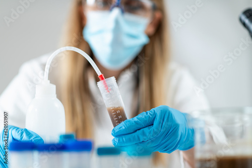 The groundbreaking process of preparing fecal transplant liquid in the lab. This technique holds immense potential for treating various gut-related conditions. 