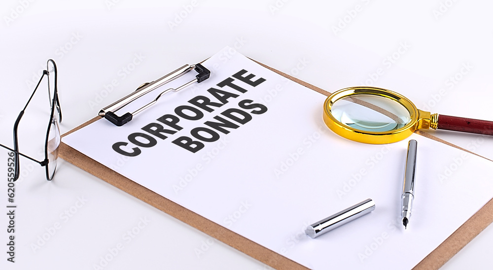 CORPORATE BONDS text on clipboard on white background, business concept