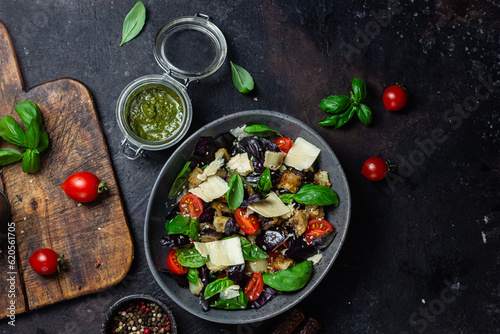 Eggplant salad, basil, cheddar cheese with tomatoes