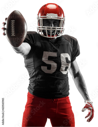Young man, professional american football player standing with ball isolated on transparent background. Motivation to win. Concept of professional sport, competition, hobby, action, concentration