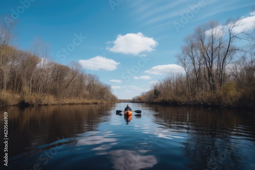 Rear view of man in kayak on calm lake with clear blue sky, created using generative ai technology