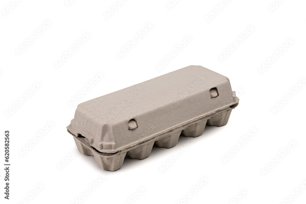 closed brown cardboard container for storing and transporting chicken eggs is isolated on a white background closed brown cardboard container for storing and transporting chicken eggs is isolated on a white background