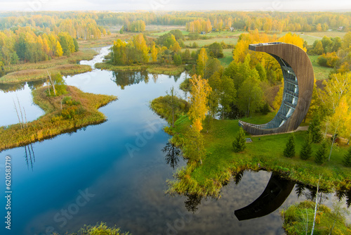 Amazing aerial view of Kirkilai karst lakes and lookout tower in the bright sunny autumn morning, Birzai eldership, Lithuania photo