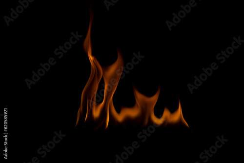 The fire flames is powerful , Shoot in a studio with a black background. 