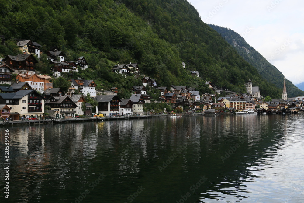 Austria's Scenic Village Enveloped by Majestic Mountains and a Sparkling Lake