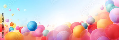 Abstract multicolored bubbles background with flying spheres or balloons, copy space. Colorful matte and glossy balls of different size on light blue background