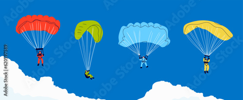 Vászonkép Skydivers flying with parachutes