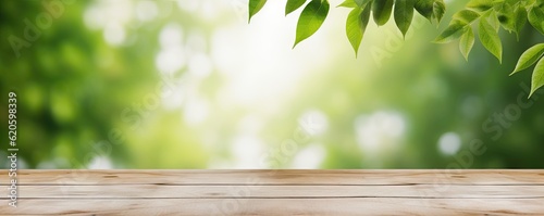 Empty wooden tabletop on wooden floor with blur abstract green leaf nature s beauty background