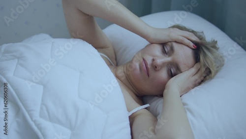 Wallpaper Mural Unhappy woman can't wake up in morning because of unbearable headache, problems with blood pressure or hangover, risk of migraine attack Torontodigital.ca