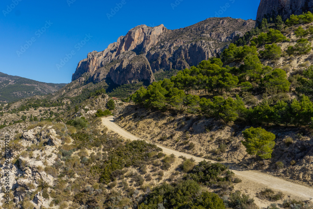 Walking to the top of the mountain.