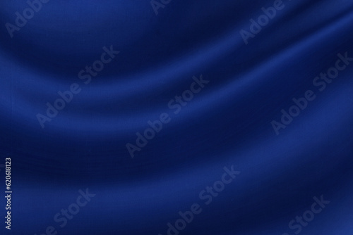 dark blue abstract background, satin silky. old navy blue color. background space design. soft wave fold
