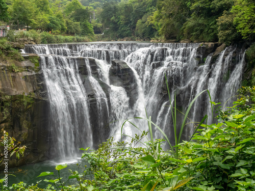 Fototapeta Naklejka Na Ścianę i Meble -  Shifen waterfall, landmark natural viewpoint near Taipei, Taiwan, in summer season.