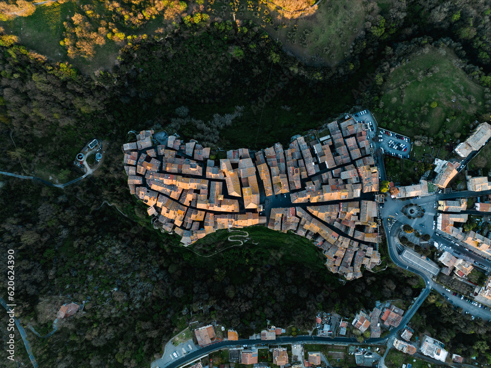 View from above, stunning aerial view of the village of Vitorchiano at sunset. Vitorchiano is a medieval Italian village in Viterbo Province, Lazio, Italy..