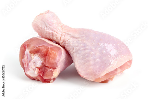 Raw chicken legs, isolated on white background.