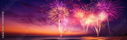 Purple  orange  white fireworks above water with reflection on the black sky background. New Year  wedding beach celebration. American holiday. Panoramic