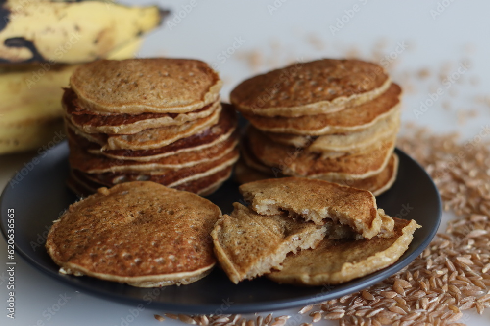 Khapli wheat plantain pancake. A healthy version of pancakes made of emmer wheat flour, ripe plantain, sweetened with jaggery Khapli wheat plantain pancake. A healthy version of pancakes made of emmer wheat flour, ripe plantain, sweetened with jaggery