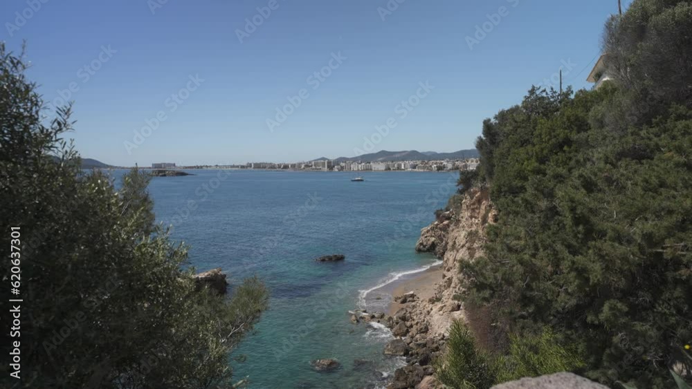 Rugged coastline toward Playa Den Bossa Sea Beach in Ibiza Town, Ibiza, Balearic Islands, Spain Rugged coastline toward Playa Den Bossa Sea Beach in Ibiza Town, Ibiza, Balearic Islands, Spain
