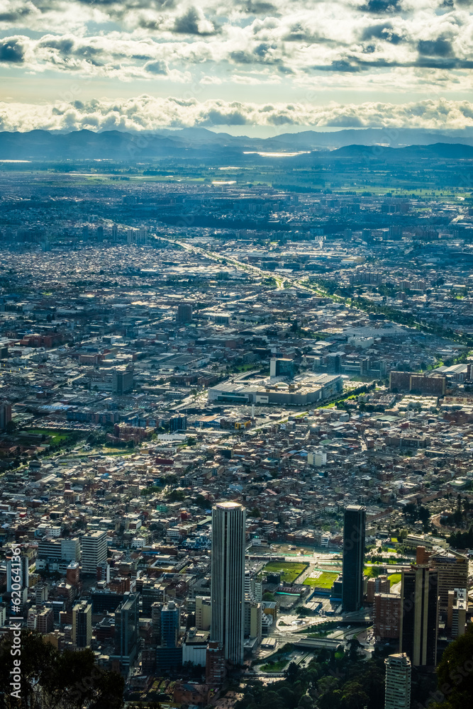Fototapeta premium vertical of Bogota Colombia skyline cityscape with andes mountains on background 