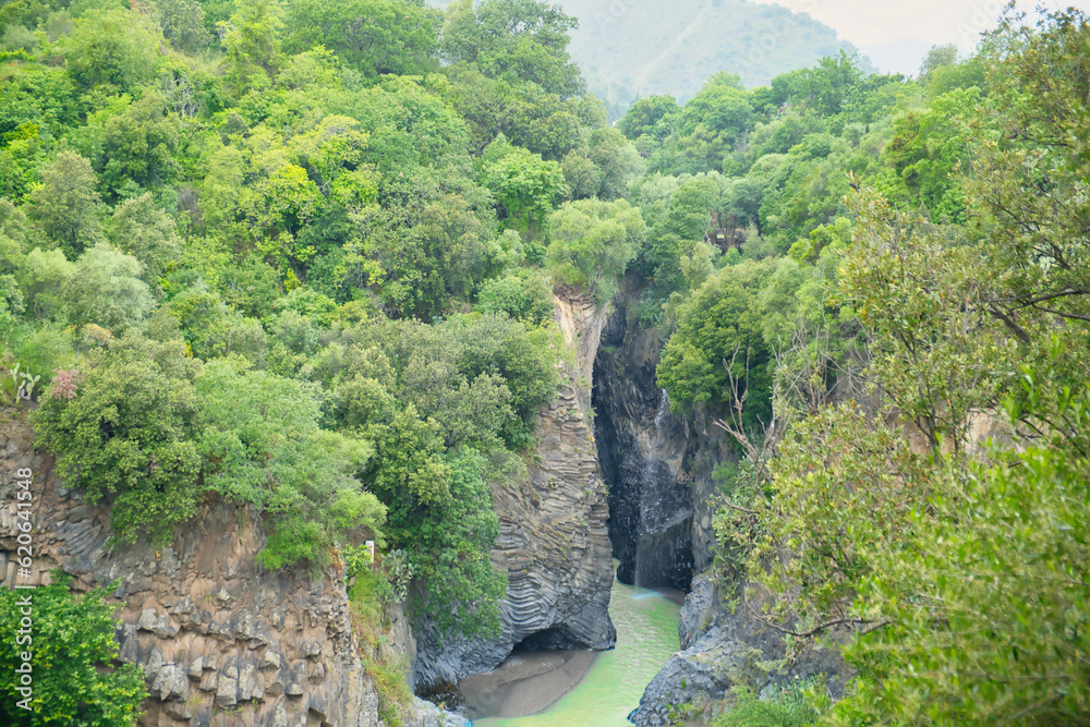 eroded lava rock and river in Alcantara Gorge in Fondaco Motta, near Catania ,Sicily, Italy