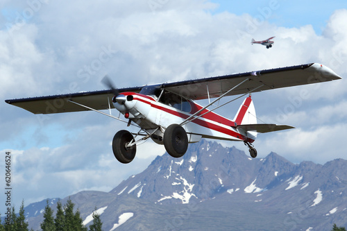 Canvas-taulu Super Cub bushplane landing at Anchorage, Alaska