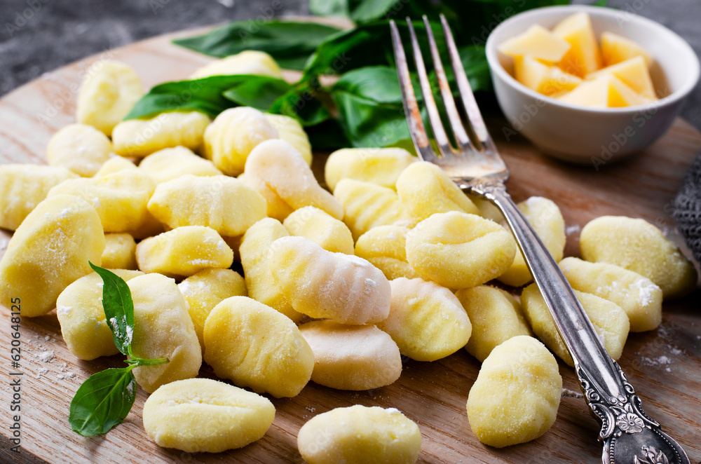 Gnocchi, Fresh Uncooked Potato Gnocchi on Wooden Board, Italian Cuisine Gnocchi, Fresh Uncooked Potato Gnocchi on Wooden Board, Italian Cuisine