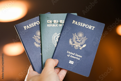 US passport and Korean passport, symbolizing global travel, immigration, citizenship, and visa, capturing the essence of international connectivity